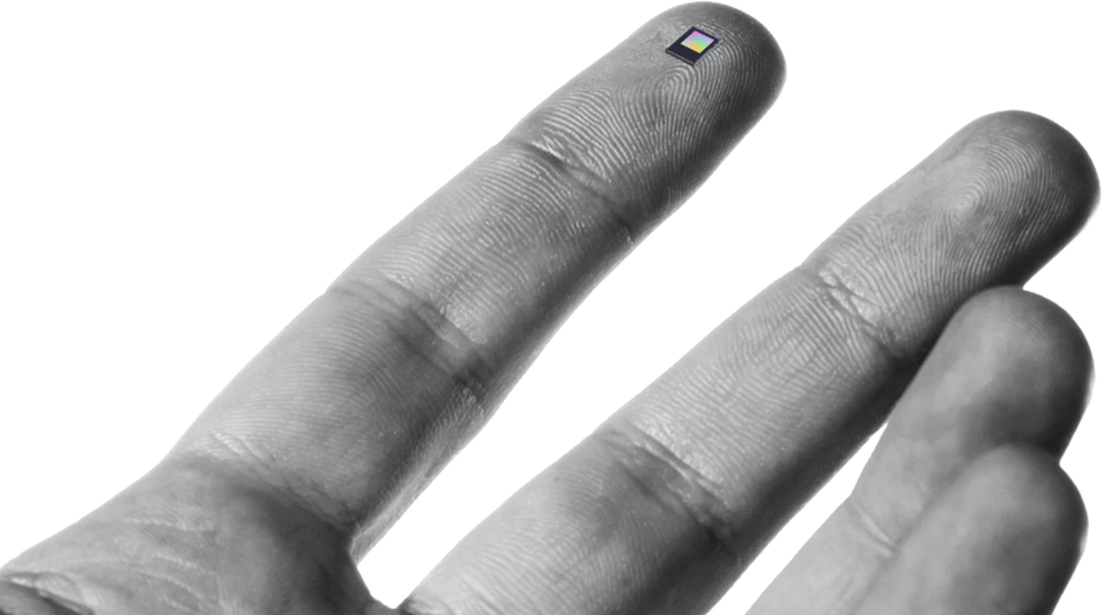 The GenX320 Event-Based Vision sensor on a fingertip, showing its compact size The GenX320 Event-Based Vision sensor on a fingertip, showing its compact size